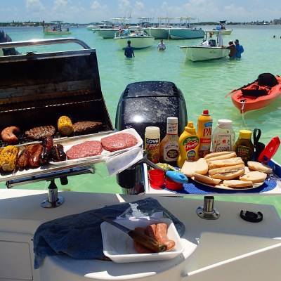 grill on back of water with food on it