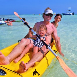 Family kayaking together